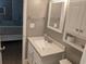 Bathroom featuring a nice sink and mirror at 7500 N Ocean Blvd. # 6061, Myrtle Beach, SC 29572