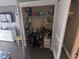 Open closet filled with cleaning and storage items at 7500 N Ocean Blvd. # 6061, Myrtle Beach, SC 29572