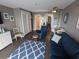 Cozy living room featuring modern furnishings and a stylish blue and white rug at 7500 N Ocean Blvd. # 6061, Myrtle Beach, SC 29572