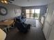 Comfortable living room with a sofa, chair, and ocean view at 7500 N Ocean Blvd. # 6061, Myrtle Beach, SC 29572