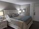 Comfortable bedroom with stylish decor and a large bed at 7500 N Ocean Blvd. # 6061, Myrtle Beach, SC 29572