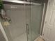 Modern shower with sliding glass door and tiled walls at 7500 N Ocean Blvd. # 6061, Myrtle Beach, SC 29572