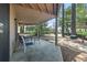 Spacious covered back patio with outdoor seating, perfect for relaxing outdoors at 752 Tall Oaks Ct., Myrtle Beach, SC 29588