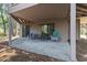 Back patio with outdoor seating area offering a relaxing space at 752 Tall Oaks Ct., Myrtle Beach, SC 29588