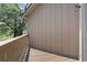 Exterior wood balcony with wood siding and view of trees and green space at 752 Tall Oaks Ct., Myrtle Beach, SC 29588