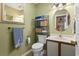 Stylish half bathroom with decorative towels and mirror at 752 Tall Oaks Ct., Myrtle Beach, SC 29588