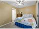 A bedroom with a whimsical comforter, a ceiling fan and a dresser at 752 Tall Oaks Ct., Myrtle Beach, SC 29588