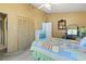 Bright bedroom featuring colorful patchwork quilt and coordinated decor at 752 Tall Oaks Ct., Myrtle Beach, SC 29588