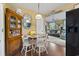 Charming dining area with hutch, round table, and view to the living room at 752 Tall Oaks Ct., Myrtle Beach, SC 29588