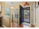 Inviting entryway featuring tile rug, wood floors, and access to deck at 752 Tall Oaks Ct., Myrtle Beach, SC 29588