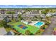 Community amenities including a swimming pool, tennis court, and well-kept landscaping at 775 Plantation Dr. # 28, Little River, SC 29566