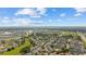 The aerial view reveals a well-planned community with ponds and walking trails surrounded by trees and open space at 775 Plantation Dr. # 28, Little River, SC 29566