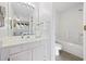 Bathroom with a shower-tub combo, white vanity, and neutral colors at 775 Plantation Dr. # 28, Little River, SC 29566
