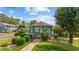 Picturesque gazebo nestled within green landscaping and community pool at 775 Plantation Dr. # 28, Little River, SC 29566