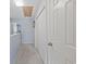 Hallway featuring a closet, light-blue walls, and white trim at 775 Plantation Dr. # 28, Little River, SC 29566