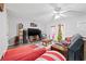 Spacious living room with neutral walls, ceiling fan, television, and access to the exterior at 775 Plantation Dr. # 28, Little River, SC 29566
