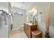This bathroom features a single vanity, a standing shower, and a bright window at 784 Caines Landing Rd., Conway, SC 29526