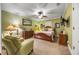 A cozy bedroom with classic furniture, ceiling fan, and carpet flooring at 784 Caines Landing Rd., Conway, SC 29526