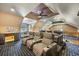 Bonus room with comfortable theatre-style seating, custom ceiling design, carpet flooring, and ample entertainment space at 784 Caines Landing Rd., Conway, SC 29526