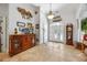 Grand foyer with tile floors, high ceilings, and decorative accents sets an elegant tone at 784 Caines Landing Rd., Conway, SC 29526