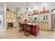 Open-concept kitchen has an island with seating and pendant lighting, ideal for entertaining at 784 Caines Landing Rd., Conway, SC 29526