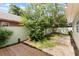 Backyard featuring a wooden deck, green lawn, and foliage, offering a private outdoor retreat at 814 Night Heron Ln., Myrtle Beach, SC 29572