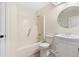 Clean bathroom featuring a shower and tub, vanity and lighting, creating a functional space at 814 Night Heron Ln., Myrtle Beach, SC 29572