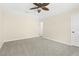 Comfortable bedroom offering soft carpeting, a ceiling fan, and neutral wall colors at 814 Night Heron Ln., Myrtle Beach, SC 29572