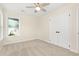 Well-lit bedroom offering soft carpeting and an overhead fan, creating a comfortable space at 814 Night Heron Ln., Myrtle Beach, SC 29572