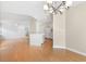 Spacious dining area showcases a contemporary chandelier and views into the kitchen at 814 Night Heron Ln., Myrtle Beach, SC 29572