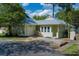 Charming single-story home featuring a one-car garage, lush landscaping, and a welcoming front entrance at 814 Night Heron Ln., Myrtle Beach, SC 29572