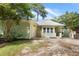 Inviting one-story home with attached garage, well-maintained landscaping, and a charming front porch at 814 Night Heron Ln., Myrtle Beach, SC 29572