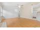 Bright living room featuring hardwood floors, neutral walls, and a ceiling fan at 814 Night Heron Ln., Myrtle Beach, SC 29572
