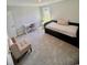 Bright bedroom featuring a bed, desk and neutral color palette at 8211 Forest Edge Dr., Myrtle Beach, SC 29579