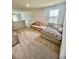 Comfortable bonus room featuring a large sectional sofa and neutral carpet at 8211 Forest Edge Dr., Myrtle Beach, SC 29579