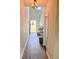 Bright foyer with modern flooring and decor, leading into the home's living spaces at 8211 Forest Edge Dr., Myrtle Beach, SC 29579