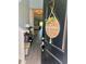 Inviting entryway featuring a charming welcome sign and a glimpse into the home's interior at 8211 Forest Edge Dr., Myrtle Beach, SC 29579