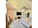 Inviting main bedroom with a decorative fireplace and a ceiling fan at 8211 Forest Edge Dr., Myrtle Beach, SC 29579