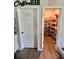 Well-stocked pantry with shelving, located conveniently next to the laundry room and a coffee bar at 8211 Forest Edge Dr., Myrtle Beach, SC 29579