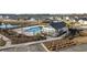 An aerial view highlights the neighborhood pool and lounge with well manicured landscaping at 8211 Forest Edge Dr., Myrtle Beach, SC 29579