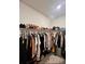 Organized walk-in closet with hanging rods, shelves, and ample storage for clothing and shoes at 8211 Forest Edge Dr., Myrtle Beach, SC 29579