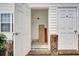 Showing the entryway with neutral walls, a tiled floor, and adjacent utility closet for storage at 8855 Radcliff Dr. Nw # 53C, Calabash, NC 28467