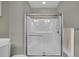 Clean and modern bathroom with a glass-enclosed shower featuring updated fixtures at 8855 Radcliff Dr. Nw # 53C, Calabash, NC 28467