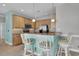 Stylish kitchen with a breakfast bar, pendant lighting, and modern appliances at 8855 Radcliff Dr. Nw # 53D, Calabash, NC 28467