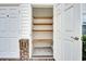 Exterior storage closet with multiple shelves at 8855 Radcliff Dr. Nw # 53D, Calabash, NC 28467
