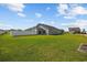 Spacious fenced backyard offers ample green space and privacy, ideal for outdoor activities and relaxation at 924 Sorano St., Myrtle Beach, SC 29579