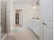 Bathroom featuring a walk-in closet, a walk-in shower, a single sink vanity, and modern finishes at 924 Sorano St., Myrtle Beach, SC 29579