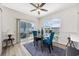 Bright dining area with sliding glass doors leading to an outdoor patio and views of the backyard at 924 Sorano St., Myrtle Beach, SC 29579