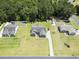 Beautiful home featuring well-manicured lawn and fenced backyard, nestled in a serene neighborhood with mature trees at 95 Timber Run Dr., Georgetown, SC 29440