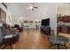 Open-concept living room featuring wood floors and vaulted ceilings at 95 Timber Run Dr., Georgetown, SC 29440